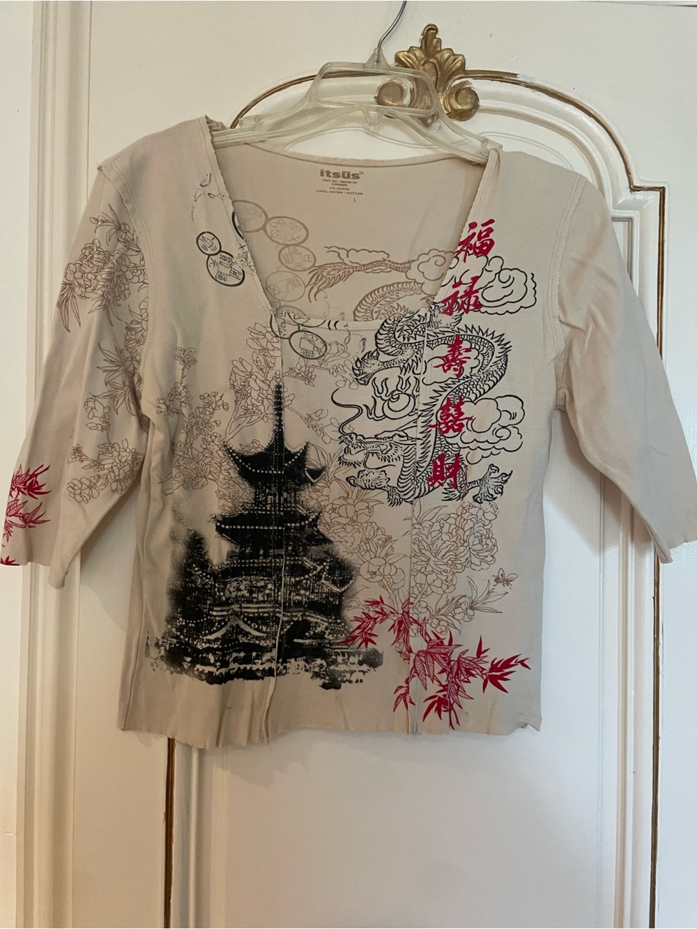 Beige Pagoda Graphic V-Neck Top with Red Accents